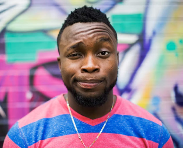 man in a colorful football shirt